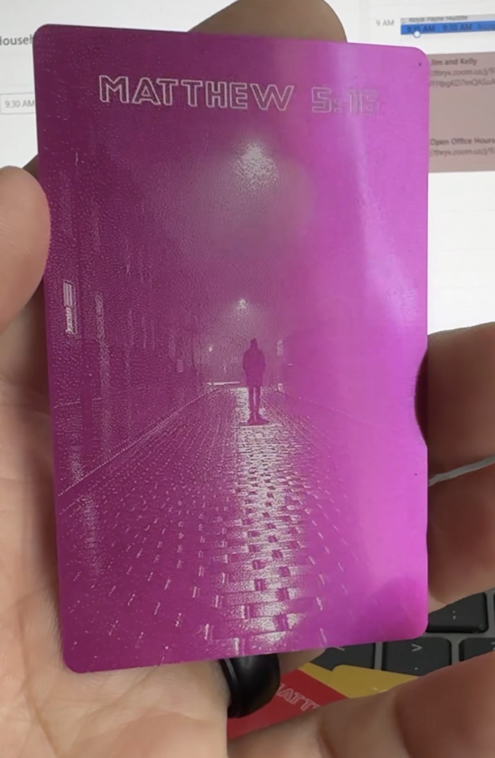 Light Post Industries Hot Pink anodized business card — back