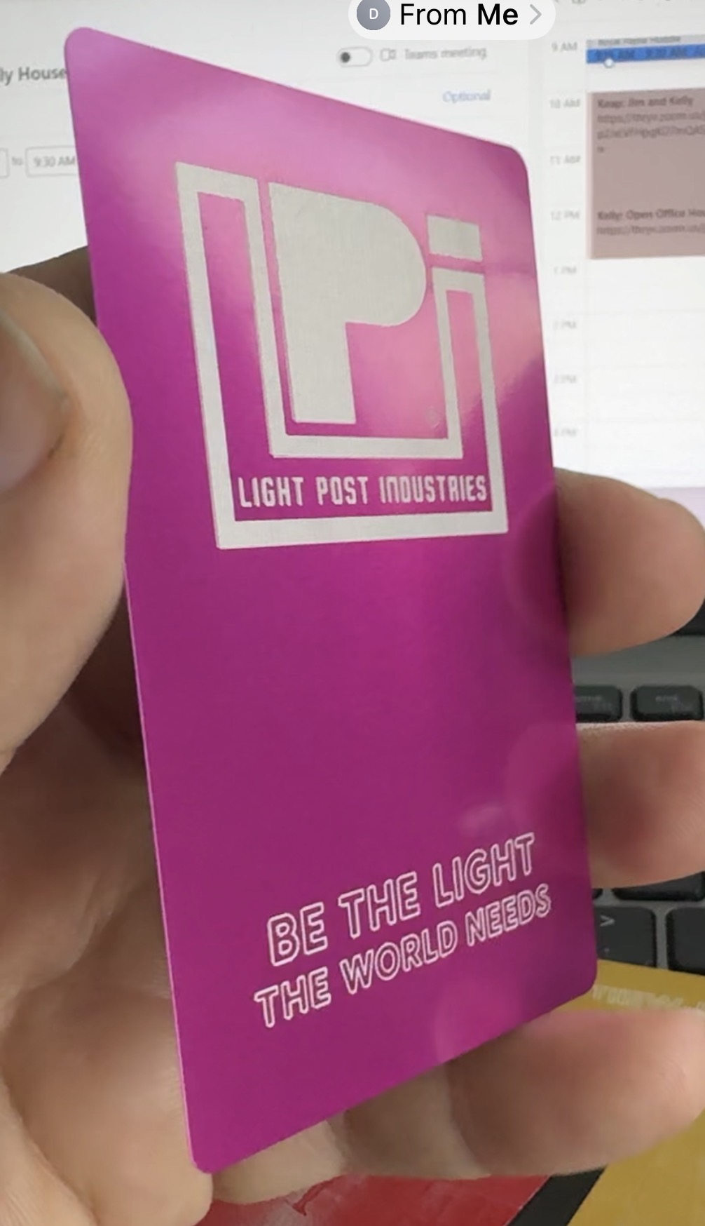 Light Post Industries Hot Pink anodized business card — front