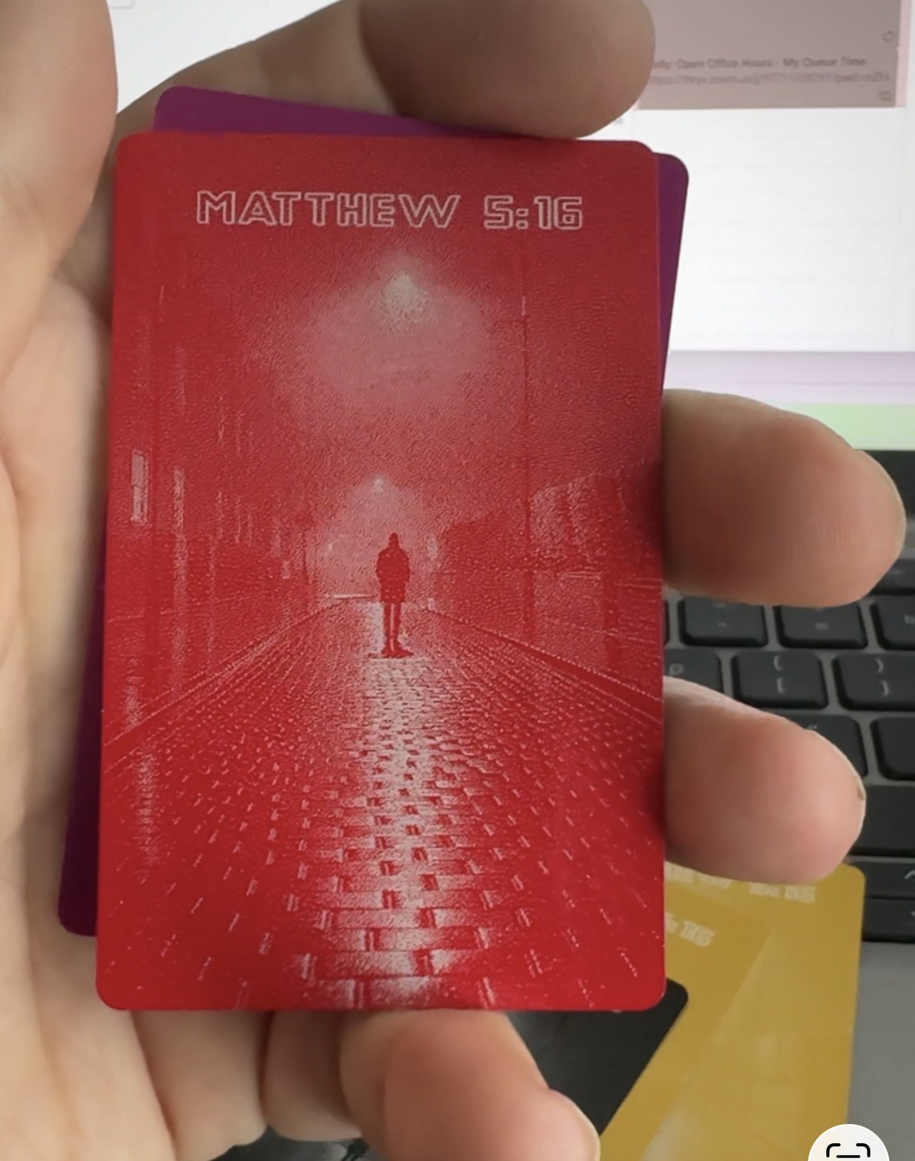 Light Post Industries Red anodized business card — back